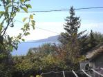 Renovation house (possible building plot) with attractive location meters from the sea
